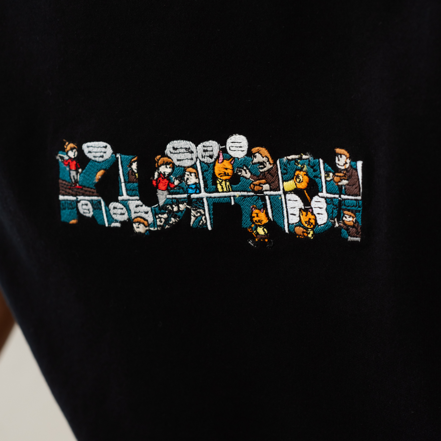 Kuroi Oversized Comic Strip Embroidered Tee | Storytelling Streetwear