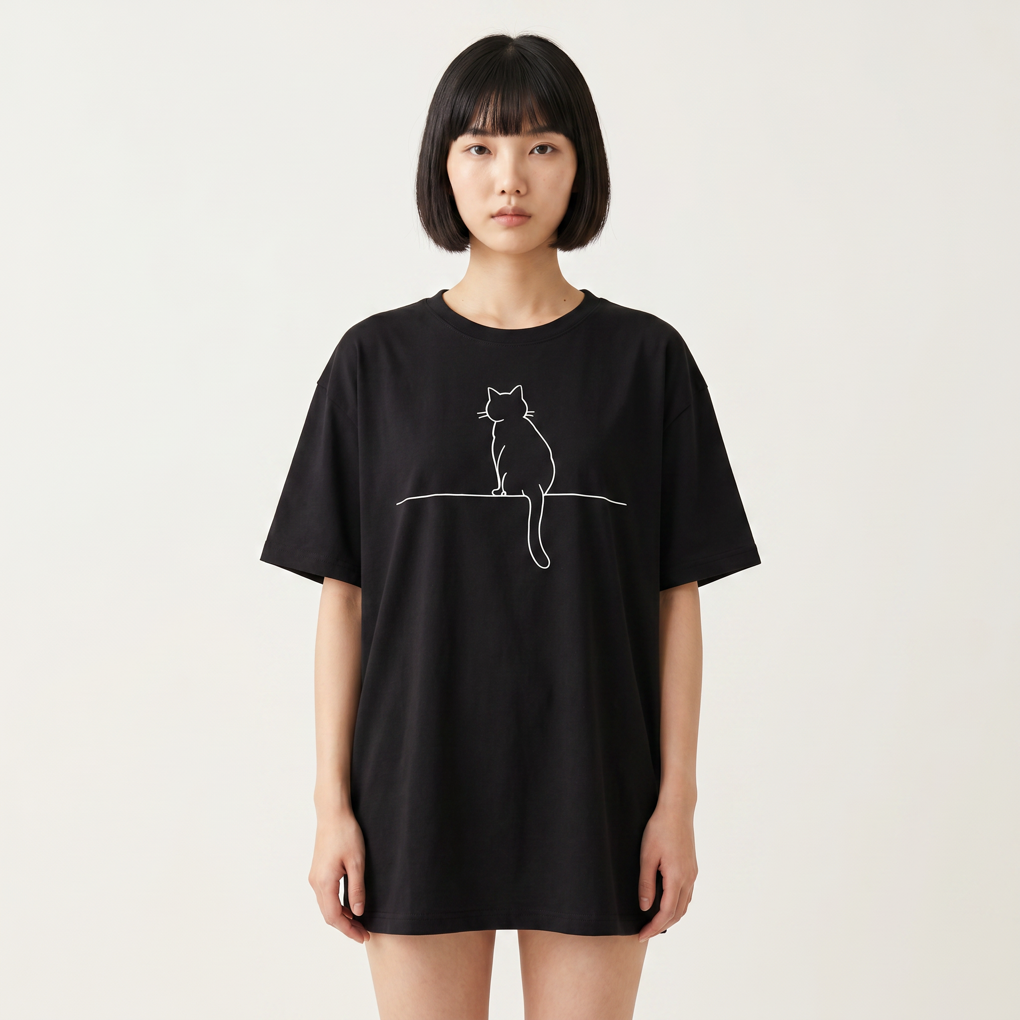 Kuroi Oversized Lucky Paw Cat Tee worn by a model, front view