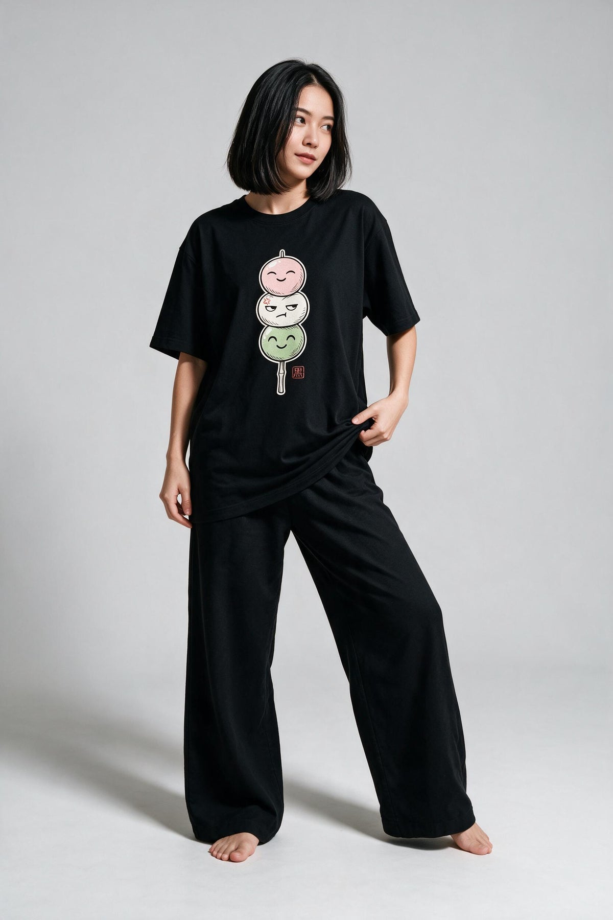 KUROI Dango oversized tee worn by model