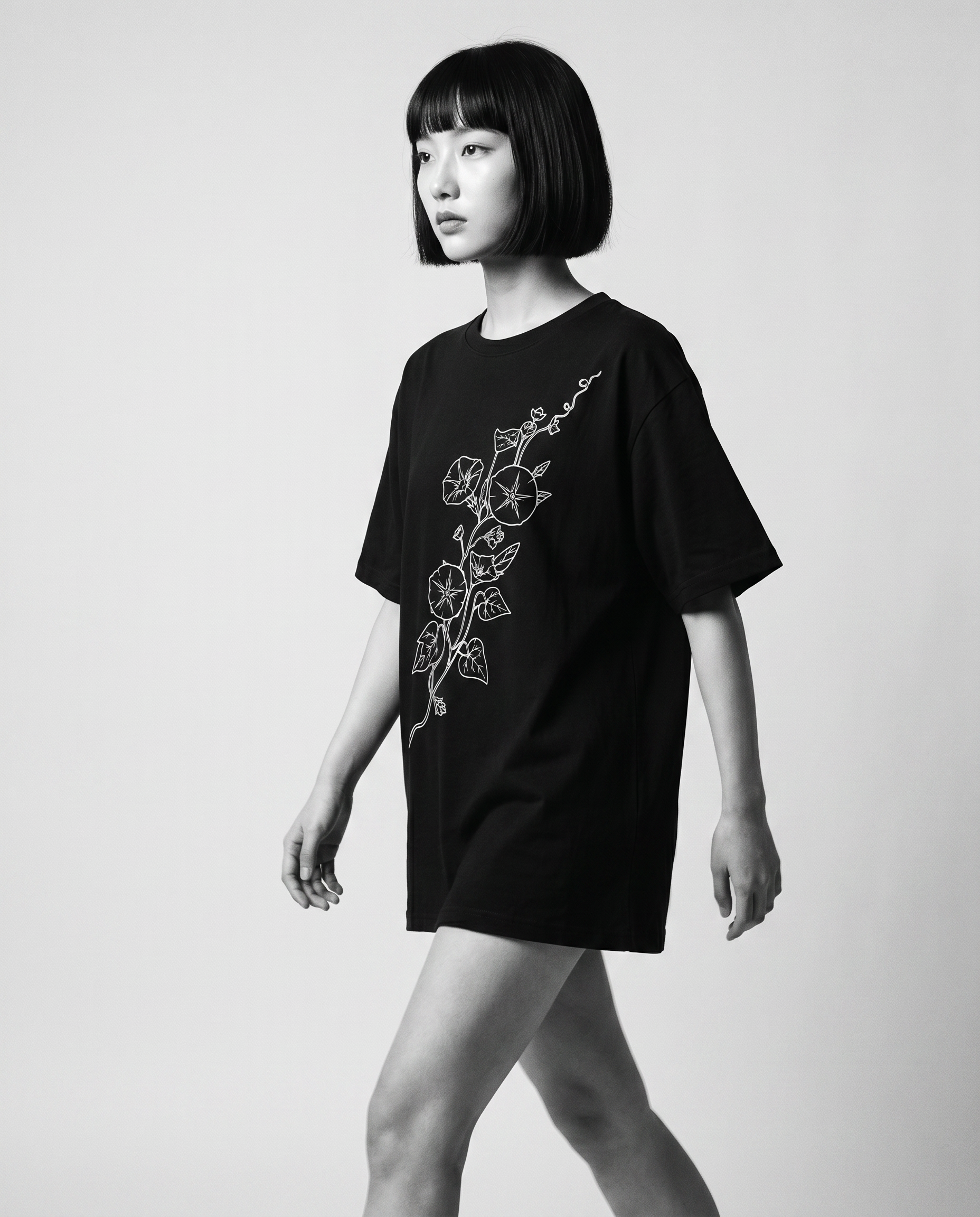 Nagi in the Kuroi Asagao Morning Glory Tee — walking