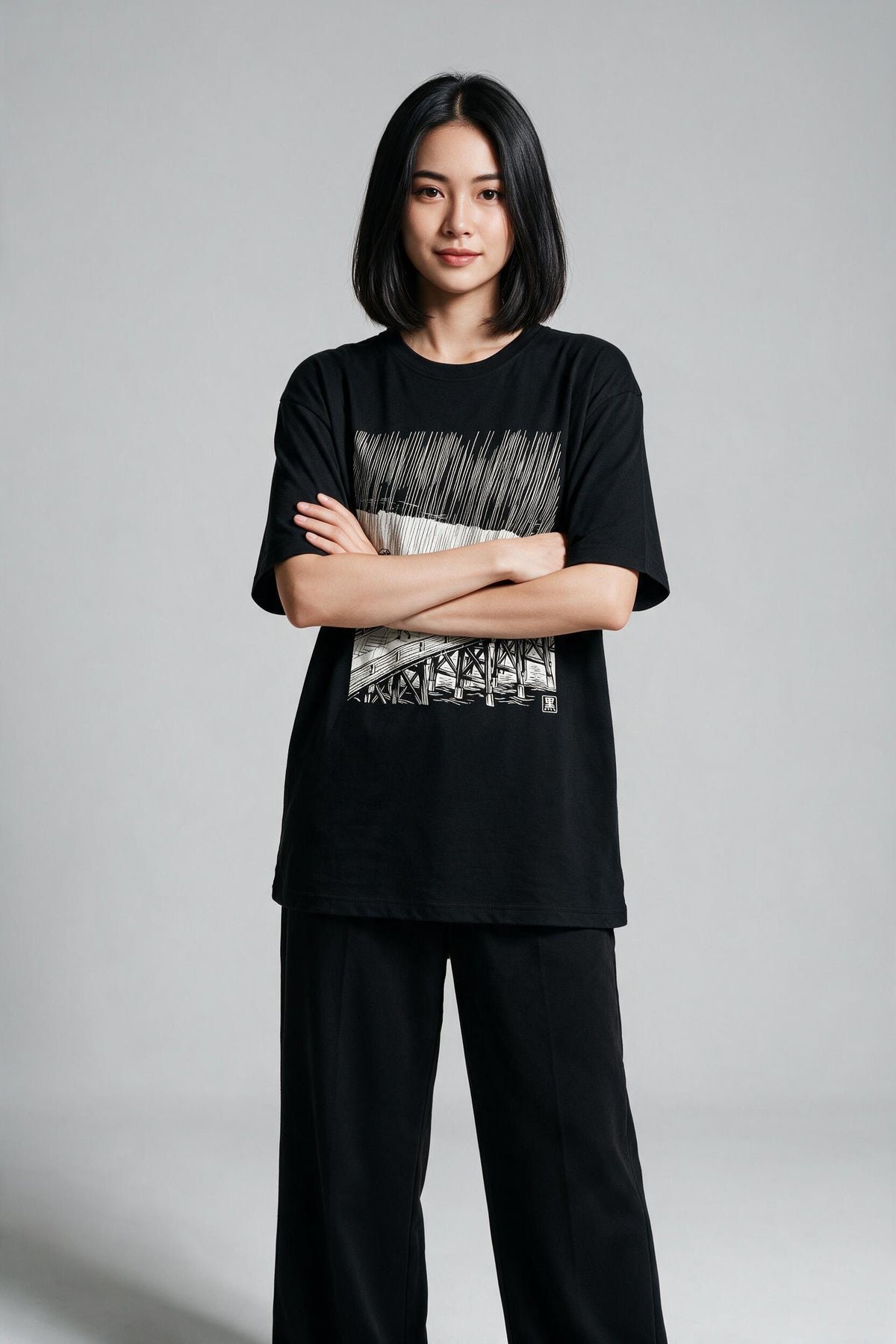 KUROI Amefuri oversized tee worn by model
