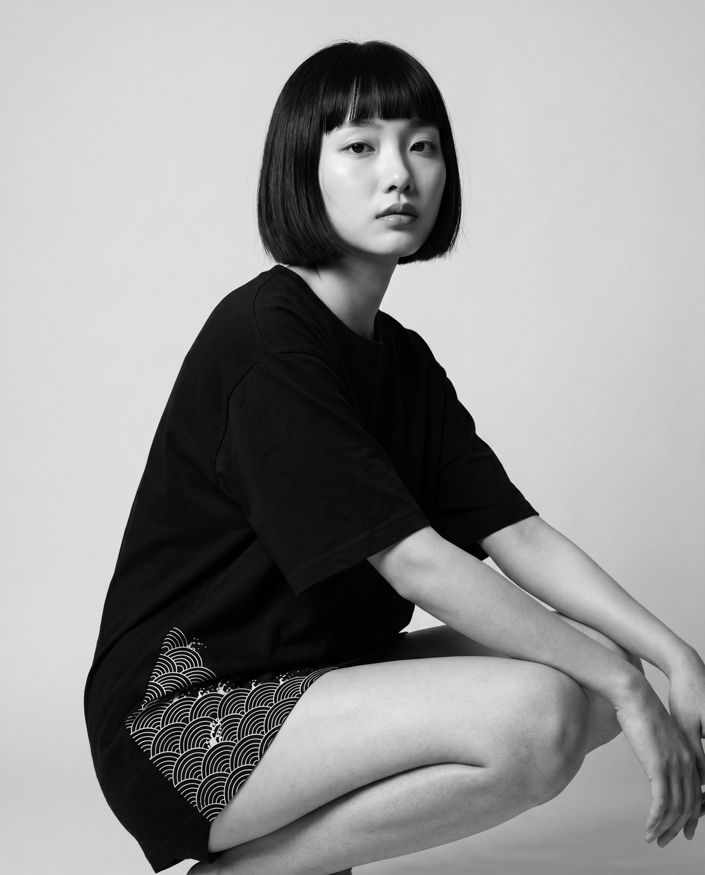 Nagi in the Kuroi Seigaiha Wave Tee — crouching