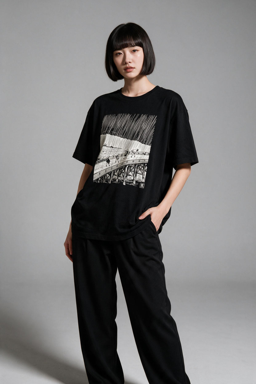 KUROI Amefuri oversized tee worn by model, front