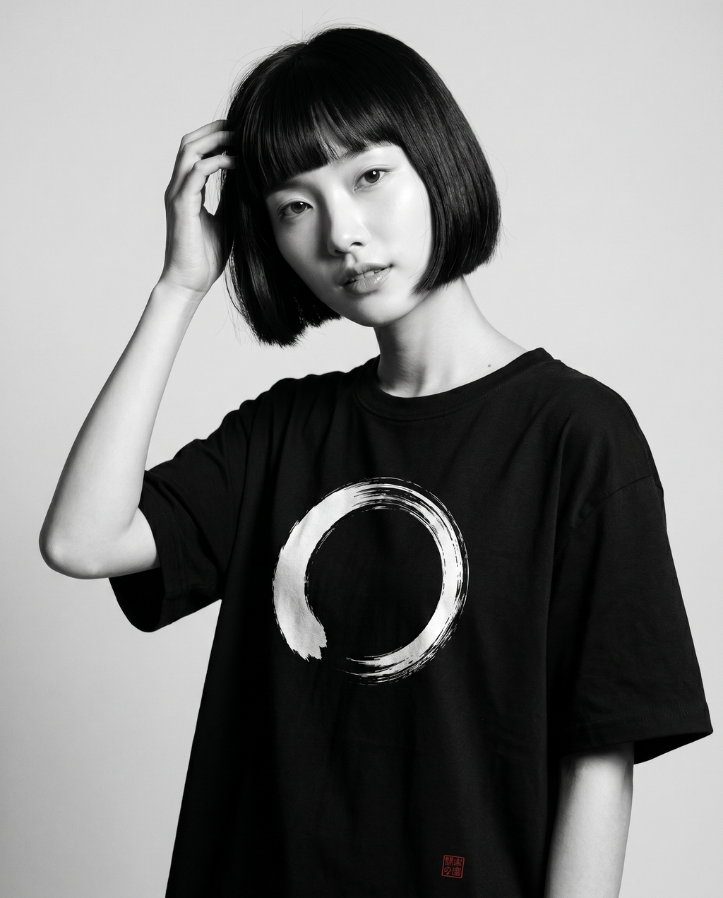 Nagi in the Kuroi Shizuka Brushstroke Tee — hand in hair