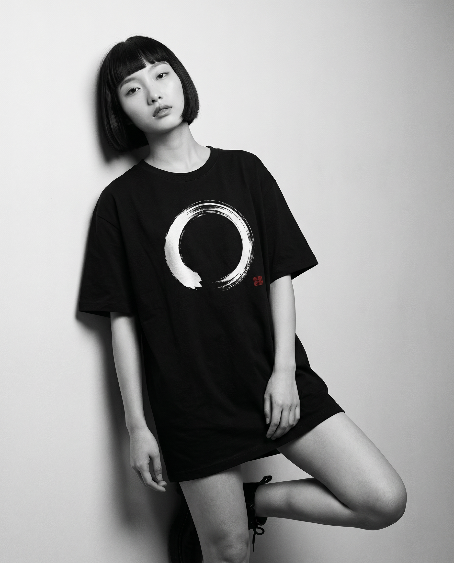 Nagi in the Kuroi Shizuka Brushstroke Tee — leaning