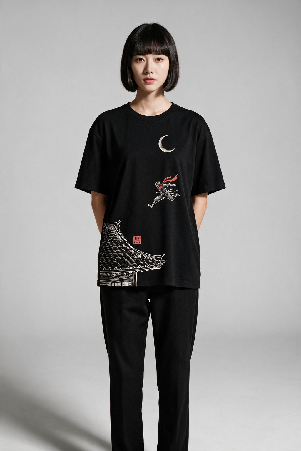 KUROI Shinobi oversized tee worn by model