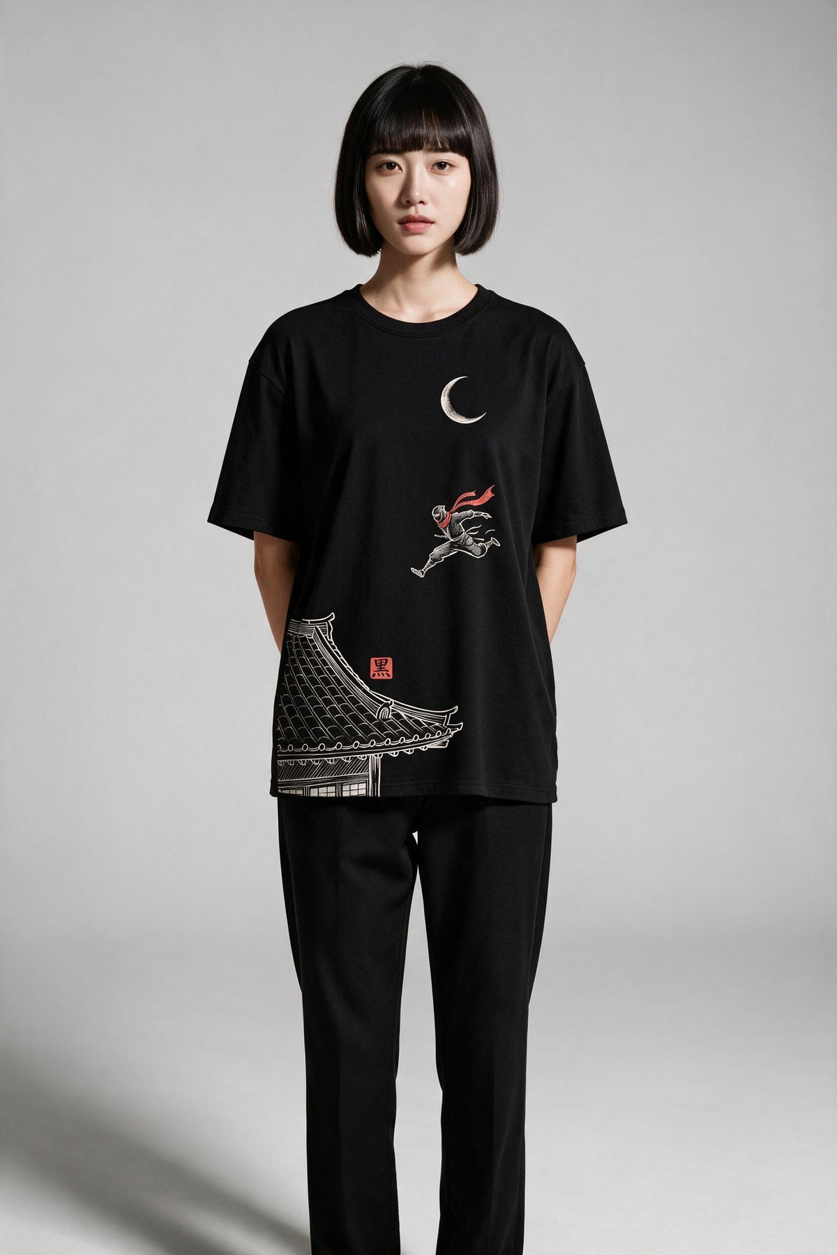 KUROI Shinobi oversized tee worn by model