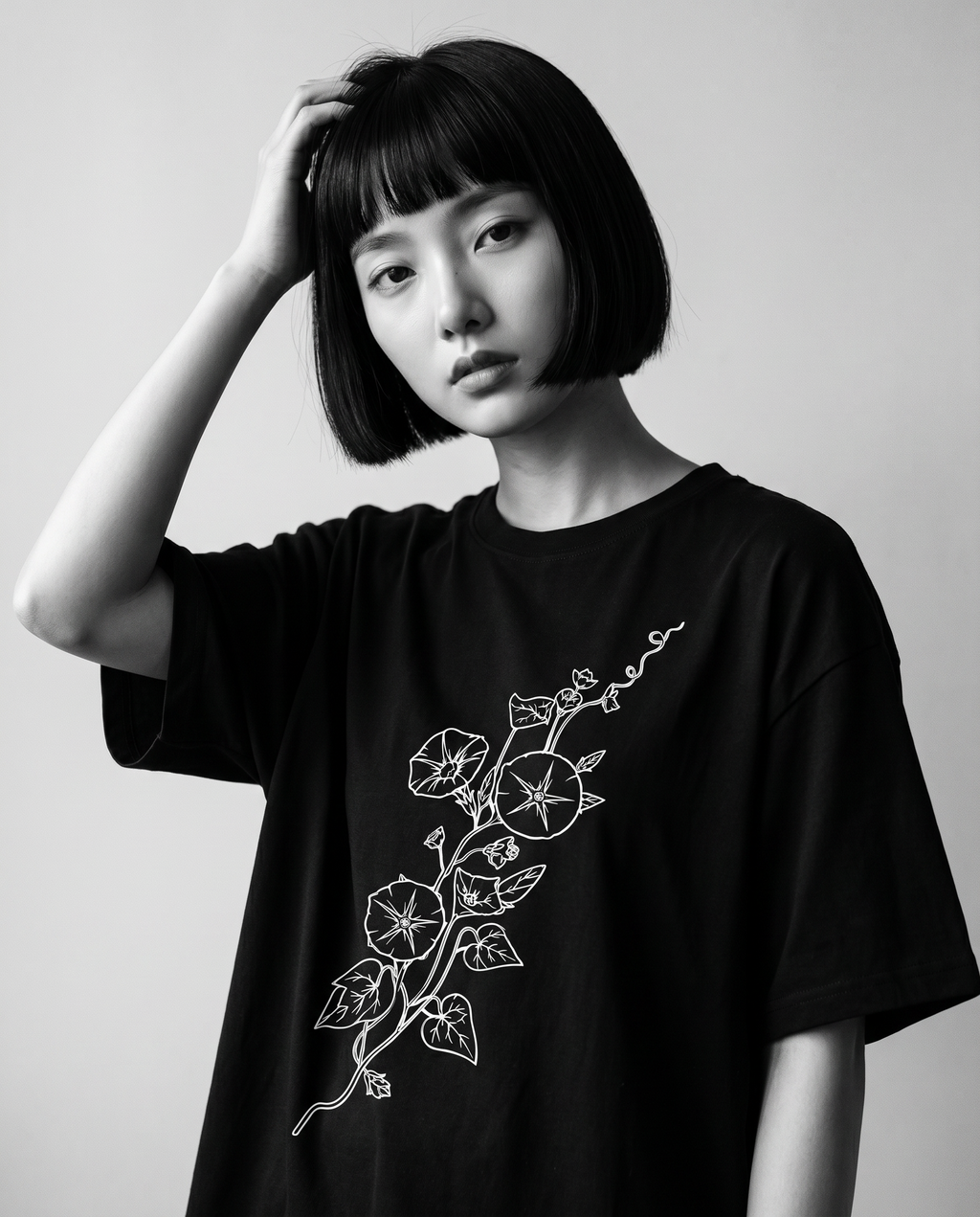 Nagi in the Kuroi Asagao Morning Glory Tee — hand in hair