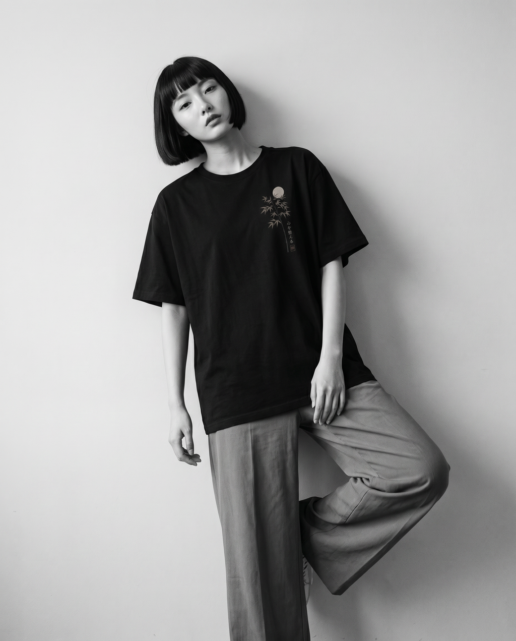 Nagi in the KUROI Kokoro wo Totonoeru Tee — leaning