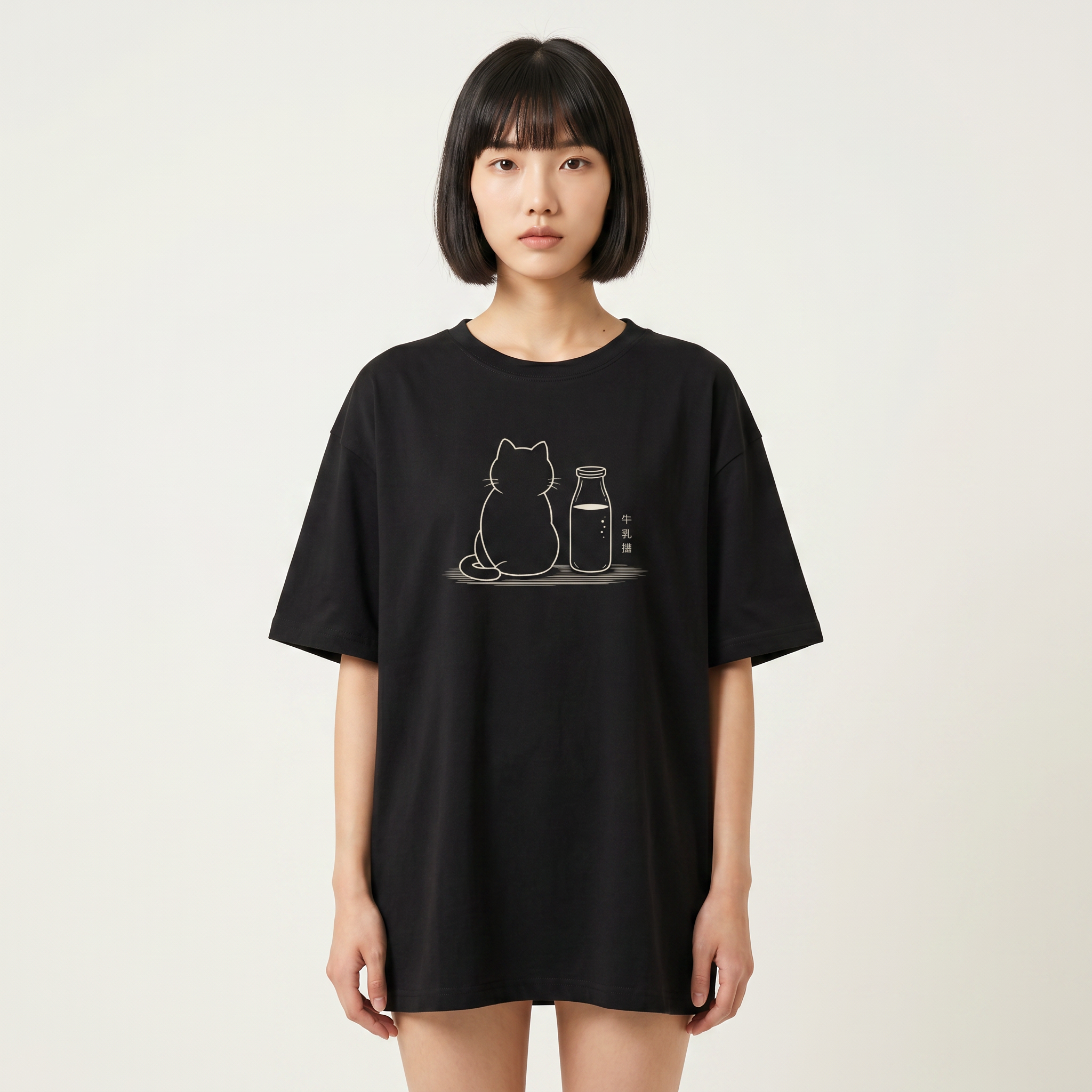 Kuroi Oversized Milk Bottle Cat Tee worn by a model, front view