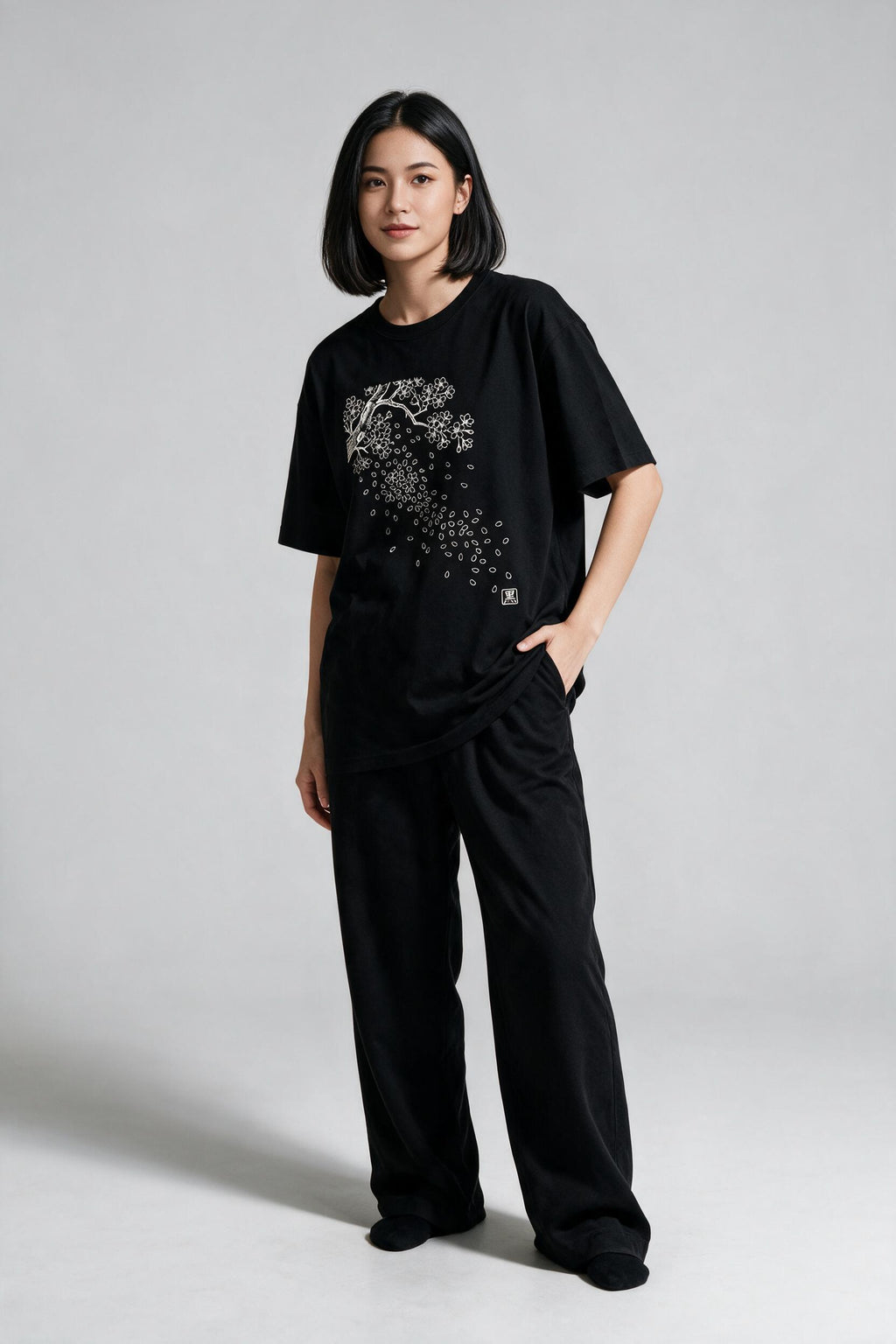 KUROI Sakura Fubuki oversized tee worn by model