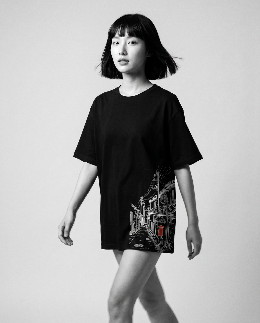 Nagi in the Kuroi Akari Koji Tee — walking