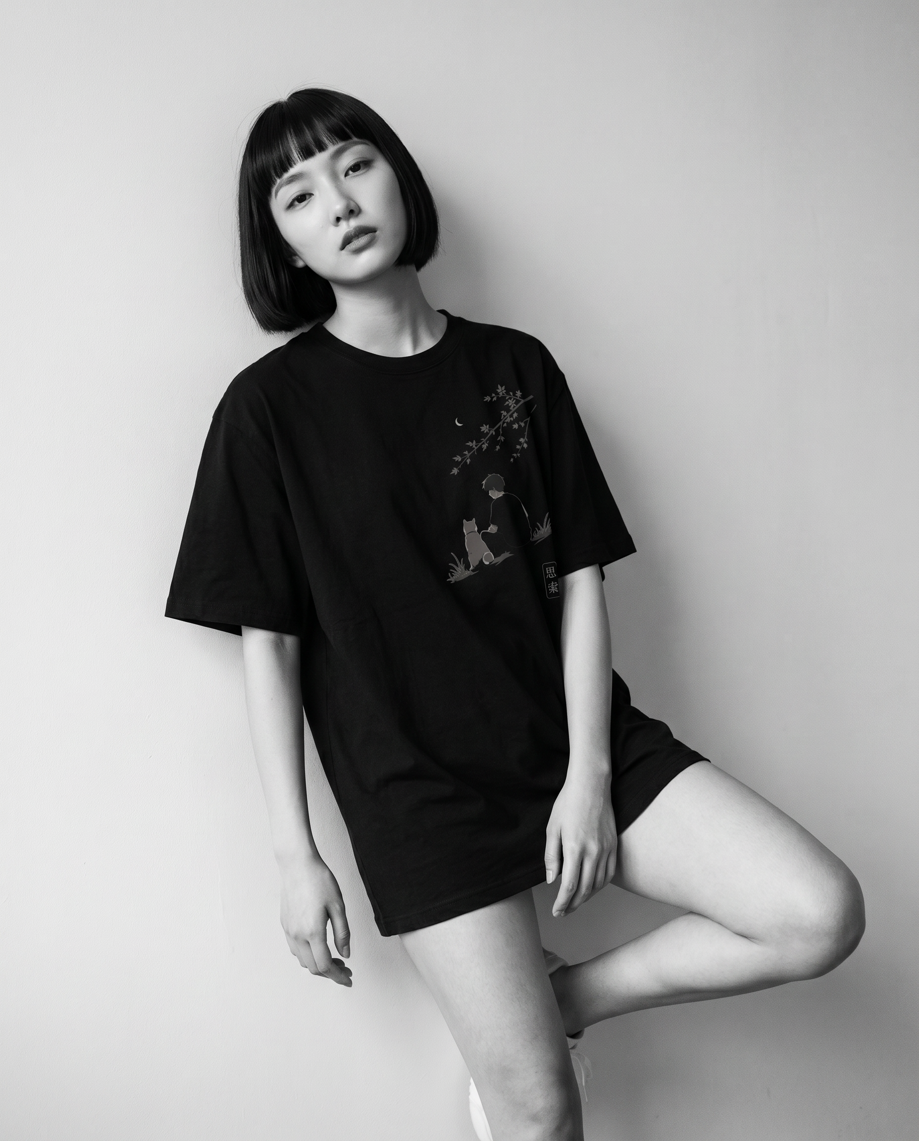 Nagi in the KUROI Shisaku Tee — leaning