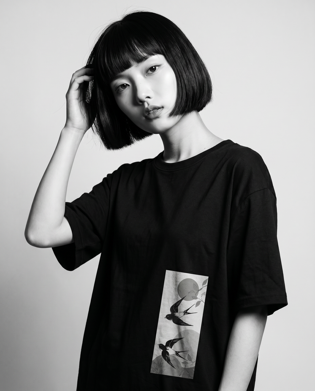 Nagi in the Kuroi Tsubame no Niwa Tee — hand in hair