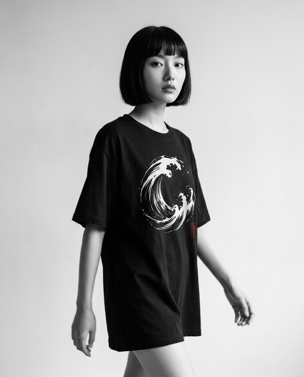 Nagi in the Kuroi Umi Nami Tee — walking