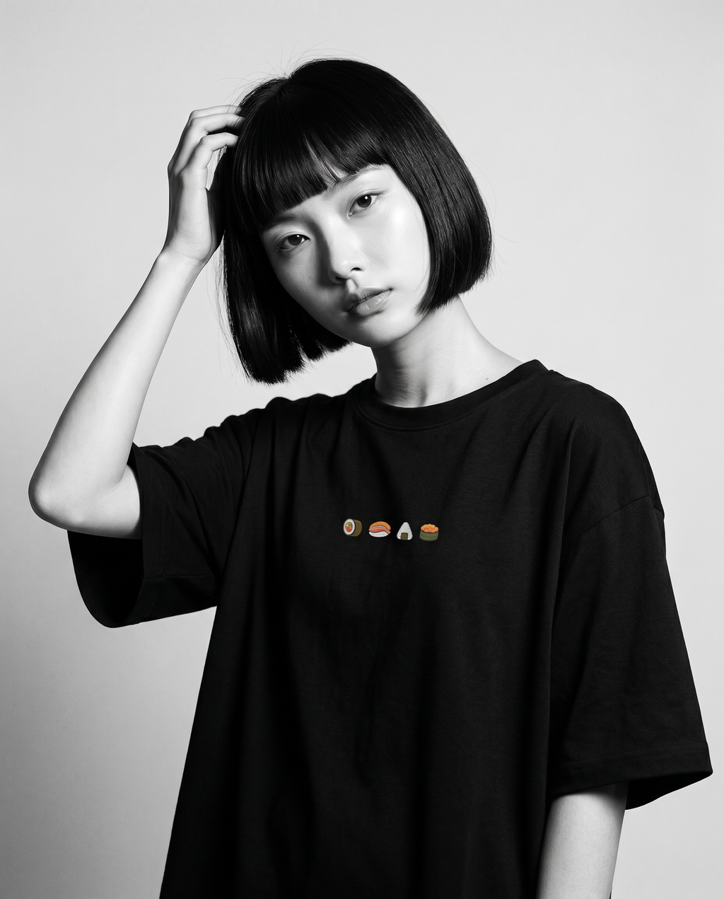Nagi in the Kuroi Sushi Tee — hand in hair