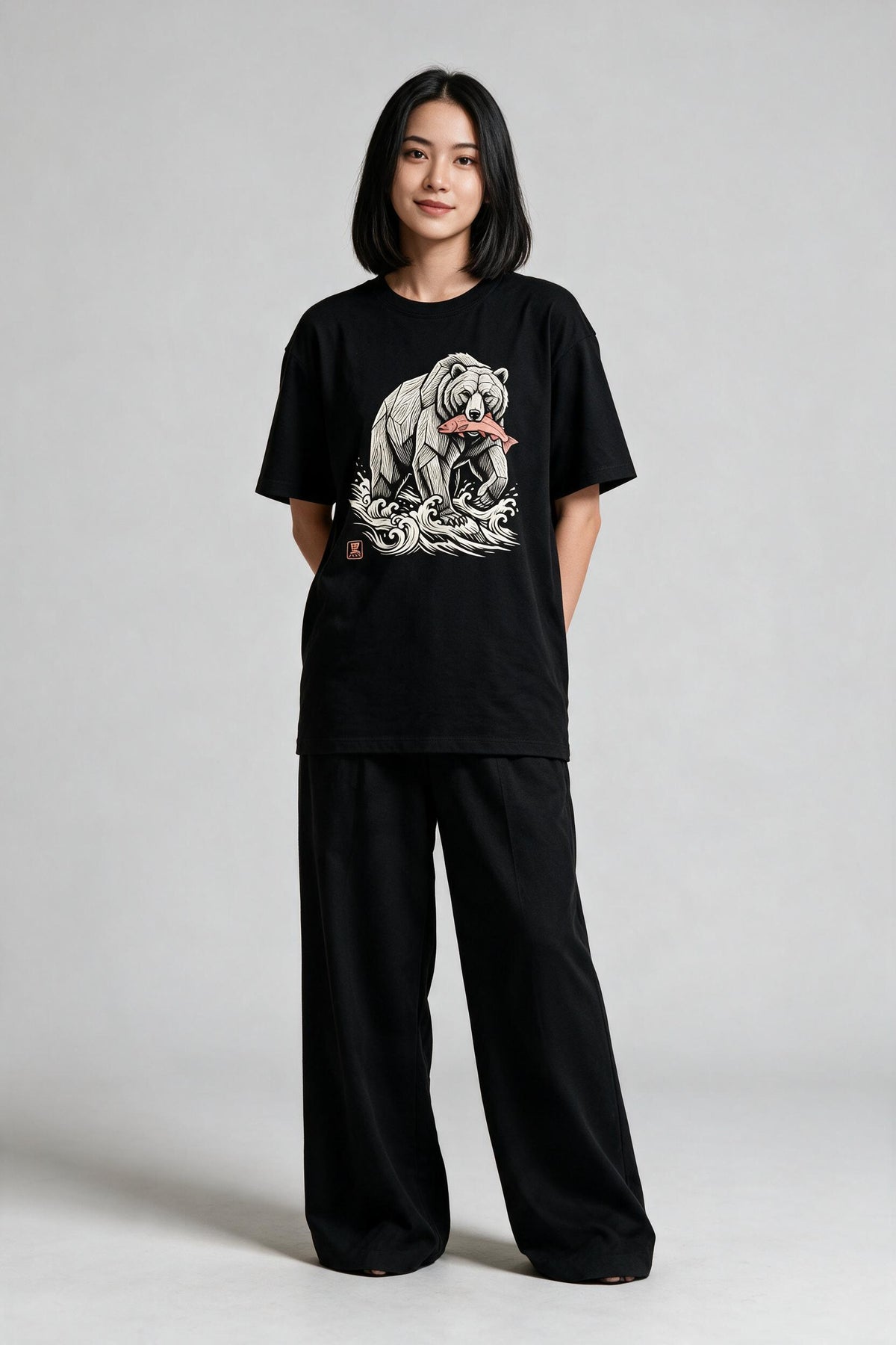 KUROI Kibori Kuma oversized tee worn by model
