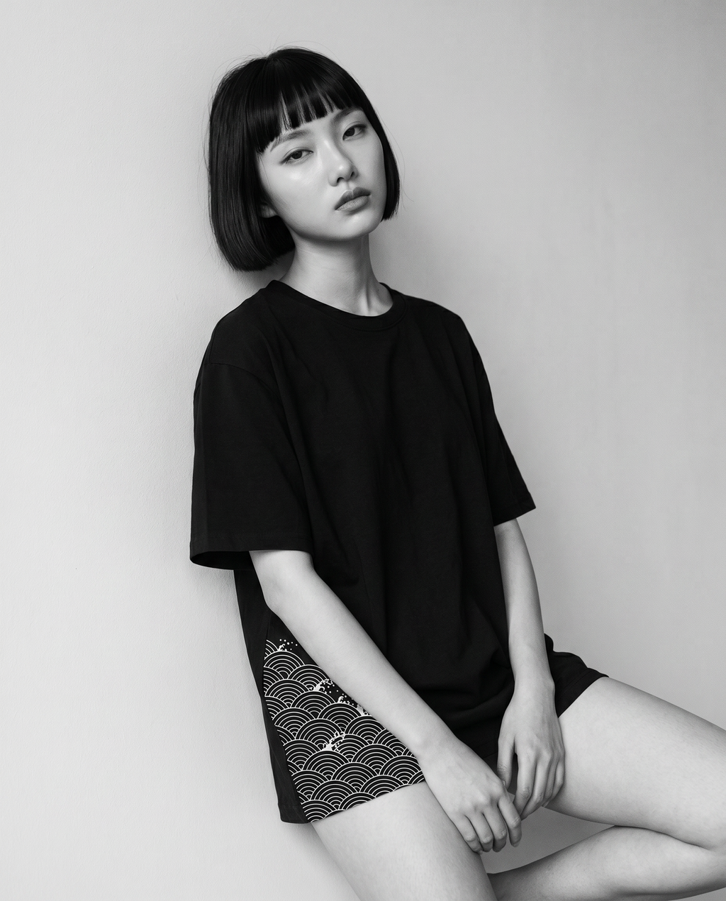 Nagi in the Kuroi Seigaiha Wave Tee — leaning