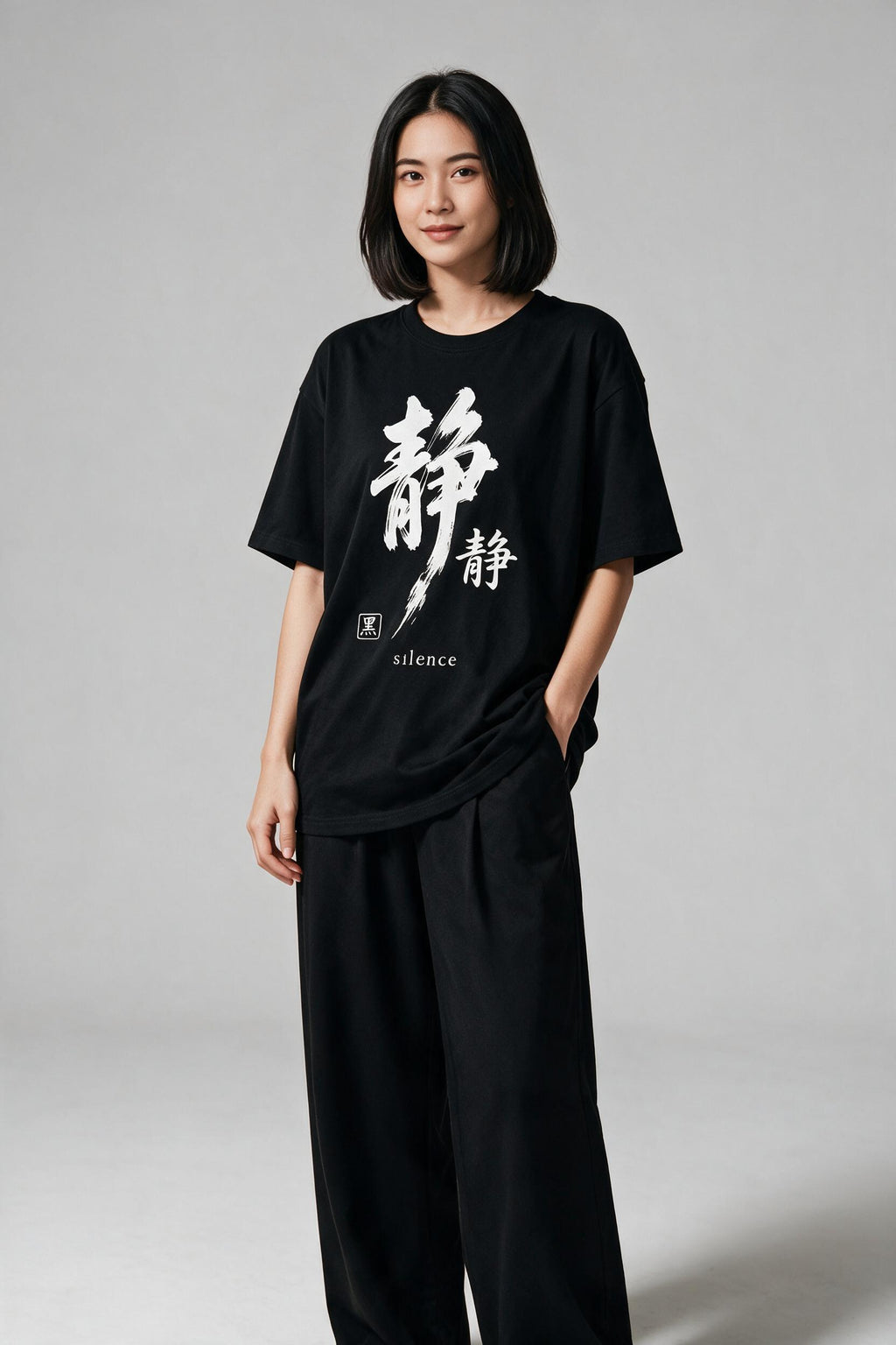 KUROI Seijaku oversized tee worn by model